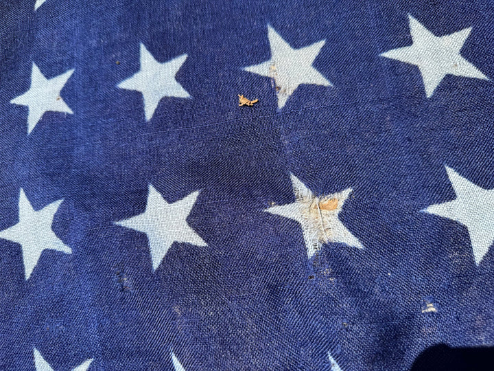Vintage American Flag with Stars and Stripes Design