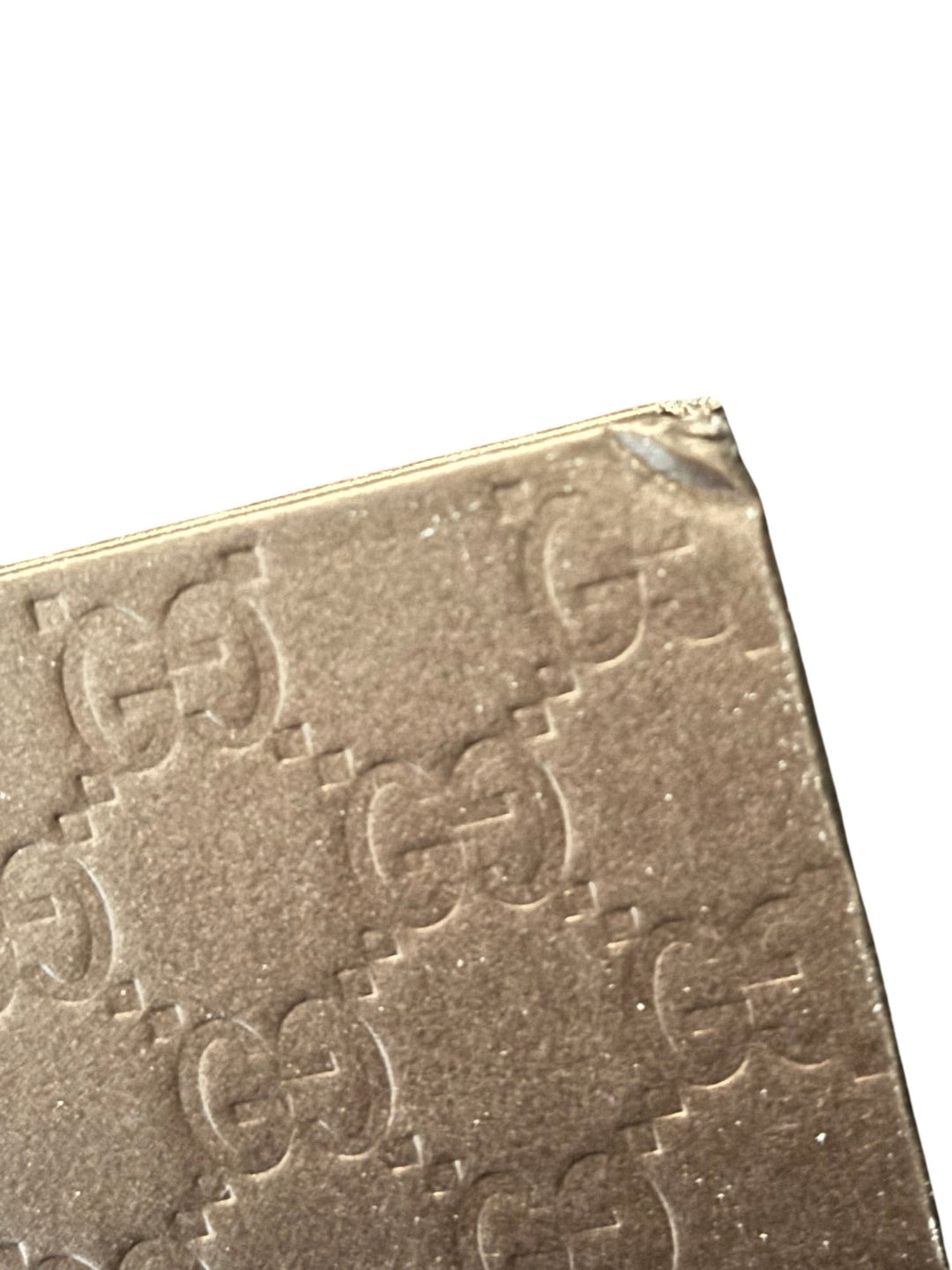 Gucci Embossed Brown Luxury Lookbook - Think Vintage ltd