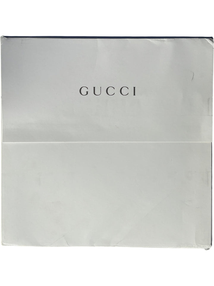 Gucci Embossed Brown Luxury Lookbook - Think Vintage ltd