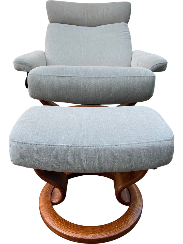 Modern Ekornes Swivel Chair with Foot Stool - Think Vintage