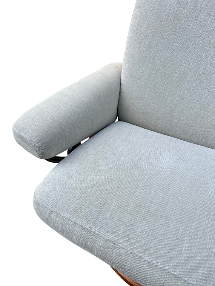 Modern Ekornes Swivel Chair with Foot Stool - Think Vintage