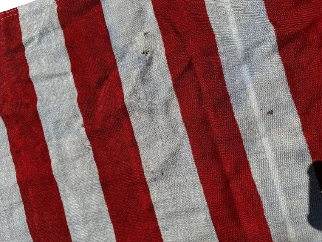 Vintage American Flag with Stars and Stripes Design